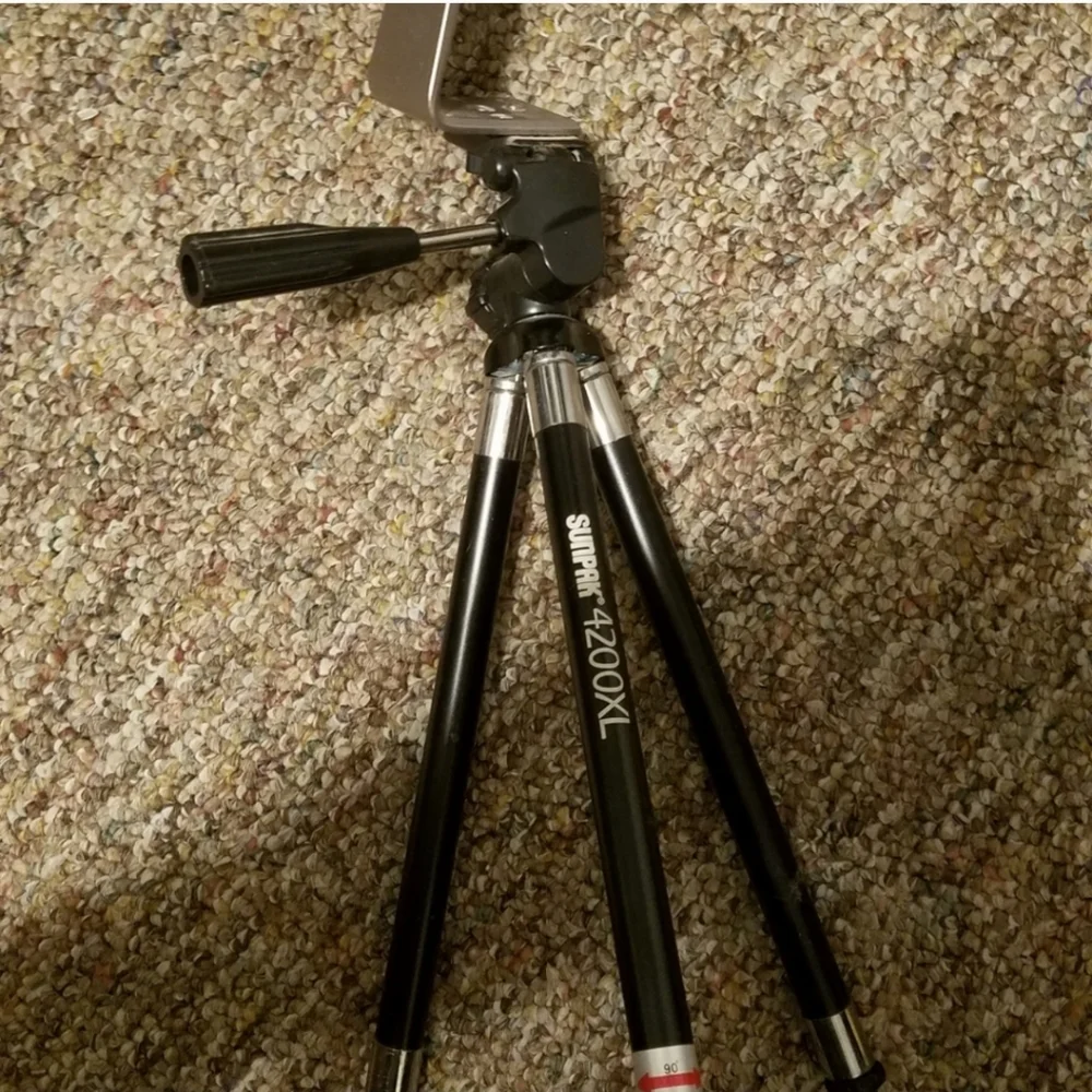 Tripod with phone adapter holster